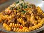 Creamy Mozzarella Rotini with Spicy Cajun Beef and Velveeta Sauce