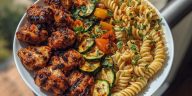 Garlic Chili Oil Chicken Bites & Cajun Alfredo with Charred Zucchini Twists