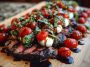 Grilled Balsamic Steak Caprese with Mozzarella, Tomatoes, and Basil