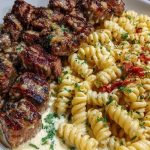 Steak Bites and Cheesy Rotini in Garlic Parmesan Sauce