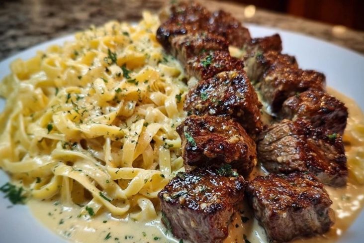 Cheesy Garlic Steak Bites over Creamy Linguine Pasta
