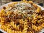 Cheesy Garlic Twisted Pasta with Cajun Ground Beef and Alfredo Velveeta