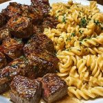 Garlic Butter Steak Bites with Spicy Cajun Alfredo Twisted Pasta