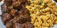 Garlic Butter Steak Bites with Spicy Cajun Alfredo Twisted Pasta