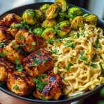 Maple Garlic Chicken Bites with Spicy Cajun Alfredo & Crispy Brussels Twists