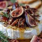 Warm Baked Brie Topped with Figs and Pecans